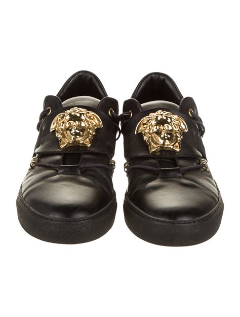 piped low-top leather sneakers versace